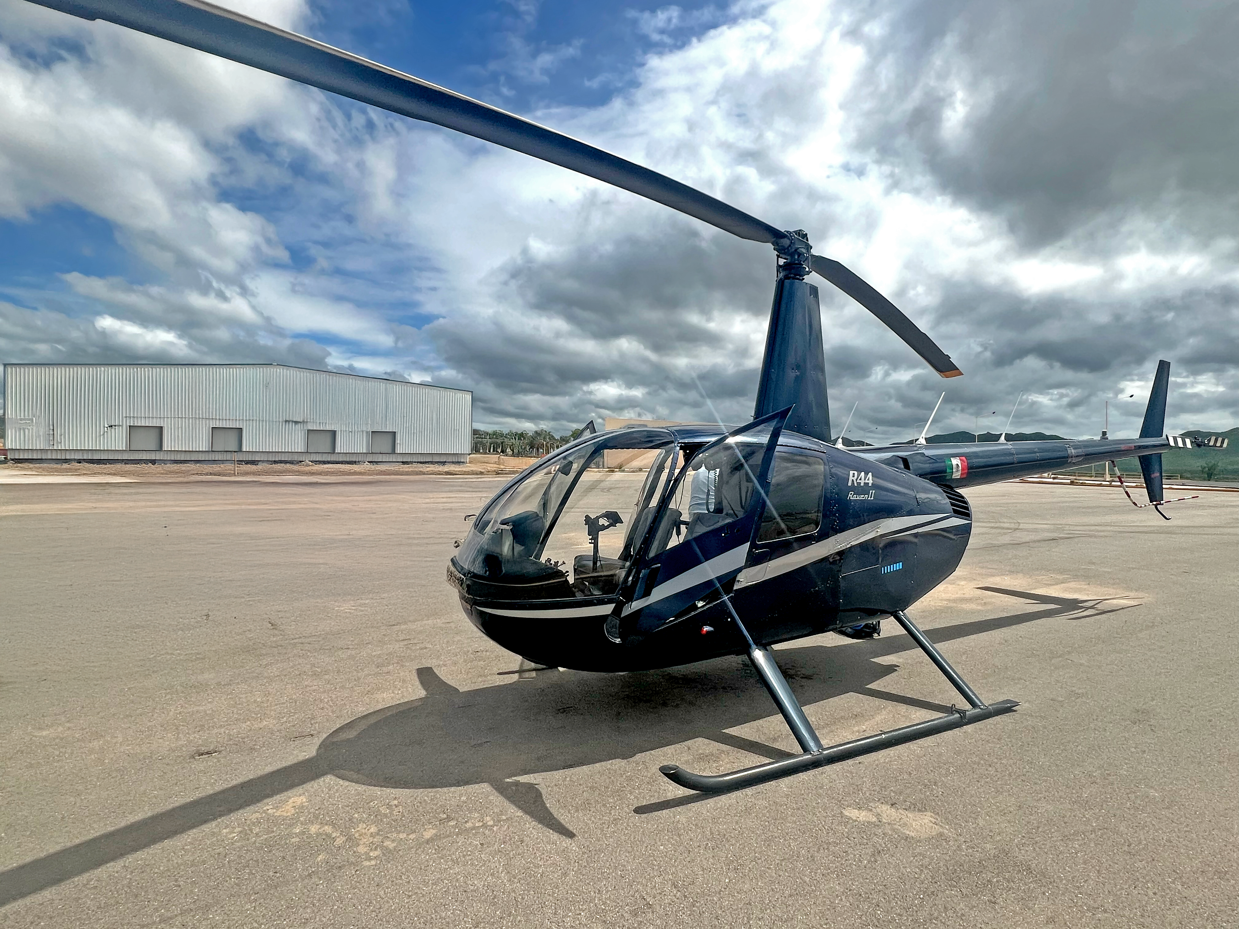 Helicopter parked on a private runway for an exclusive tour